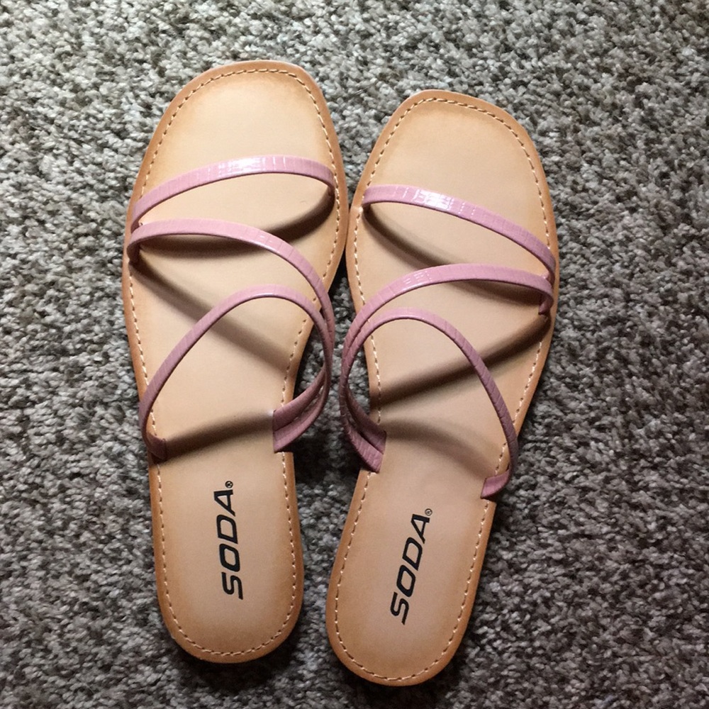 Brand new, never worn sandals. Size 7.